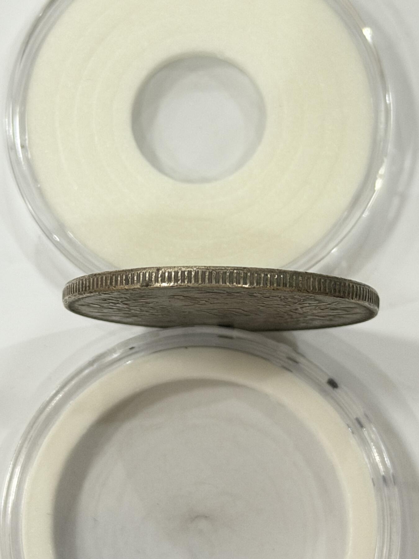 海外回流精品拍卖（机制币） 袁像壹圆（十年，带底光，保真）