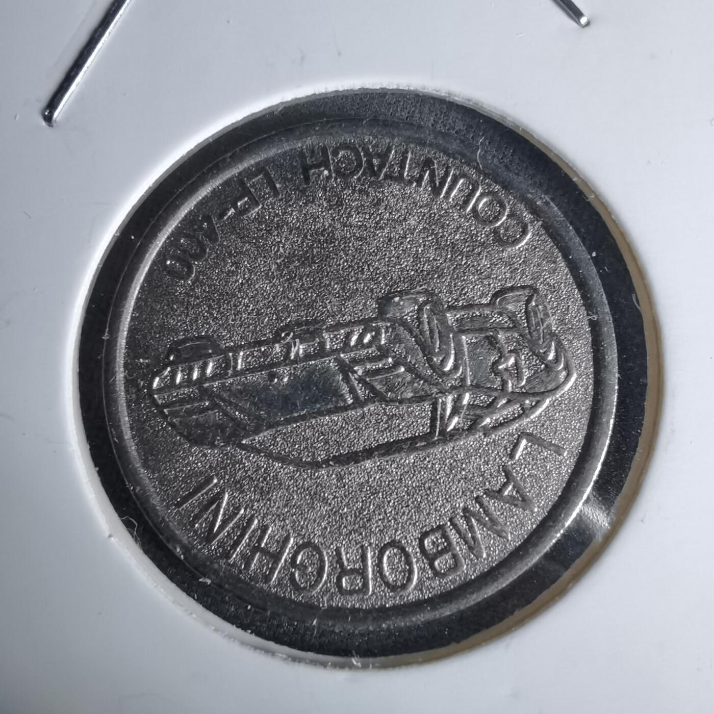 沼泽如烟--第1044场 汽车纪念章