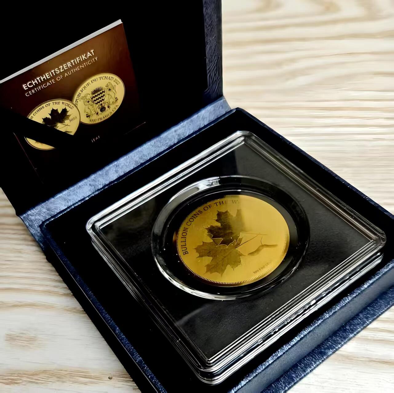 长老汇马年精选第十六场拍卖 珍惜！乍得2022年5000中非法郎 加拿大枫叶精制金币 999纯金 40mm 后配包装和证书齐全   市面不可见，兼具收藏投资属性