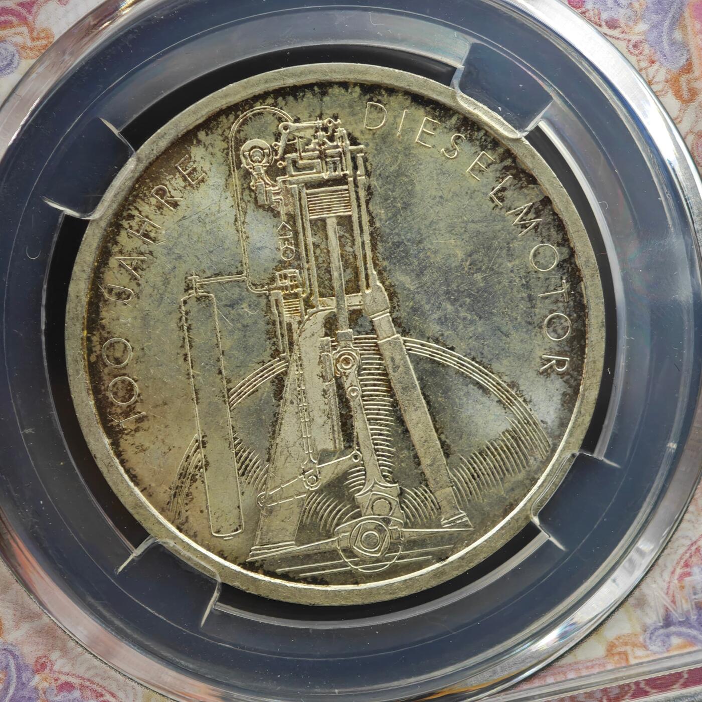 4月8日结束，成斌徽章钱币专场 众诚评级1997年德国柴油发明机100周年10马克银币15.5g