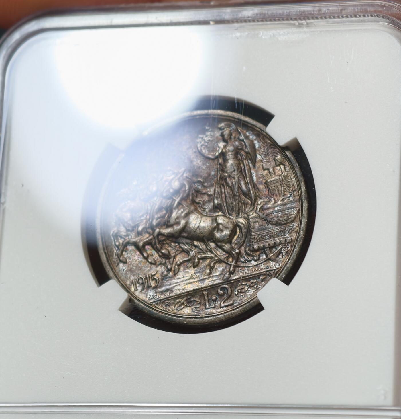 甄臻铺-世界币章拍卖（第59期），甄品场拍品征集中，送拍享返佣金等优惠多多 NGC-AU53 1915年意大利2里拉，紫罗兰包浆，状态超级好，低评了