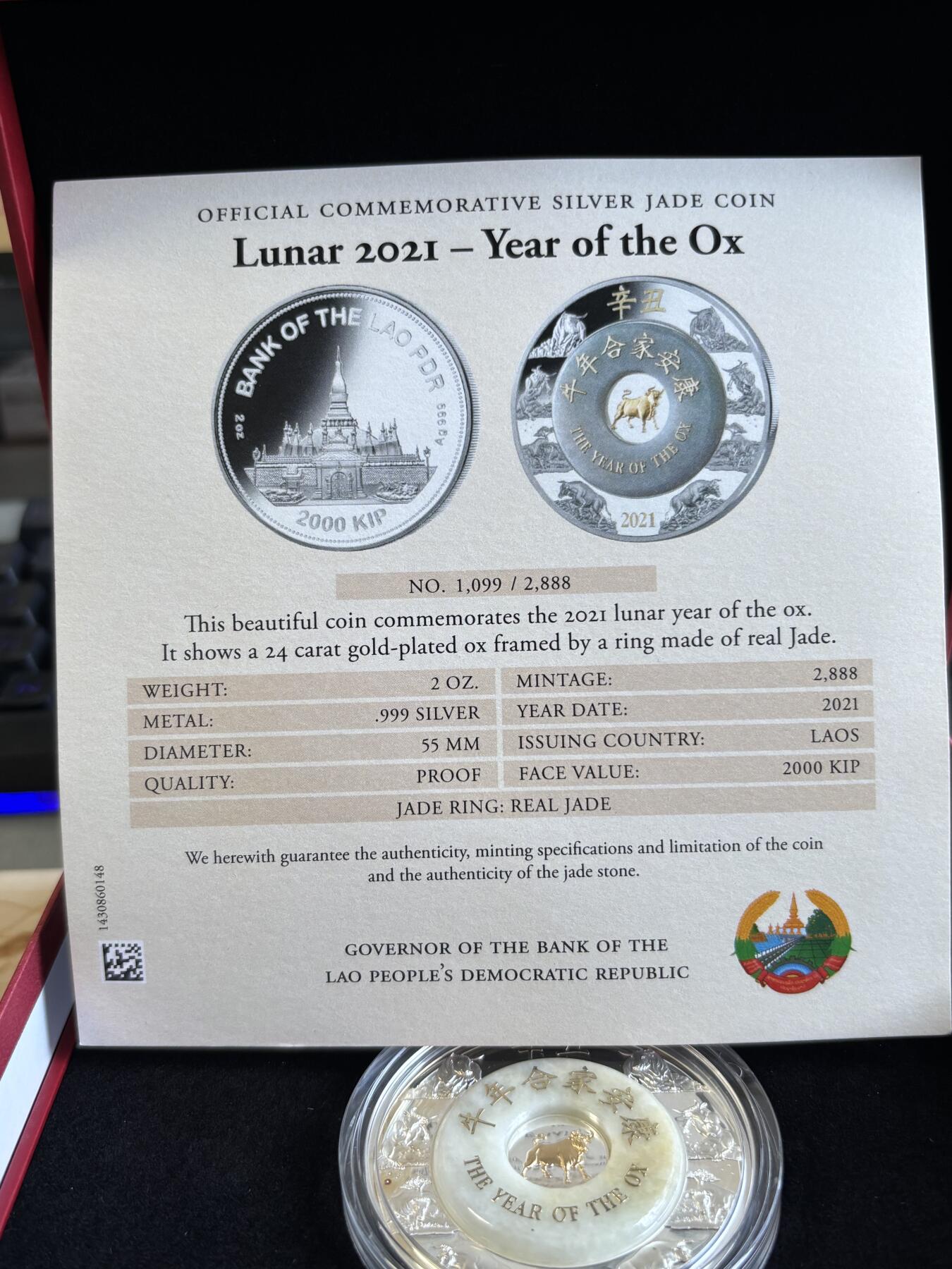 第197期拍卖 老挝2021年中国生肖系列牛年2盎司镶金玉纪念银币，999银，发行2888枚，有氧化