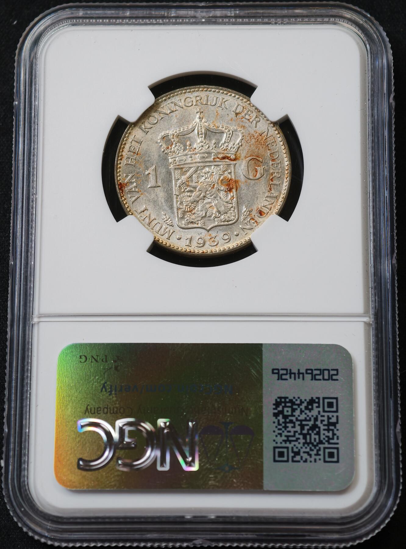 甄臻铺-世界币章拍卖（第59期），甄品场拍品征集中，送拍享返佣金等优惠多多 NGC-UNCD 1939年荷兰威廉明娜1盾，转光好看