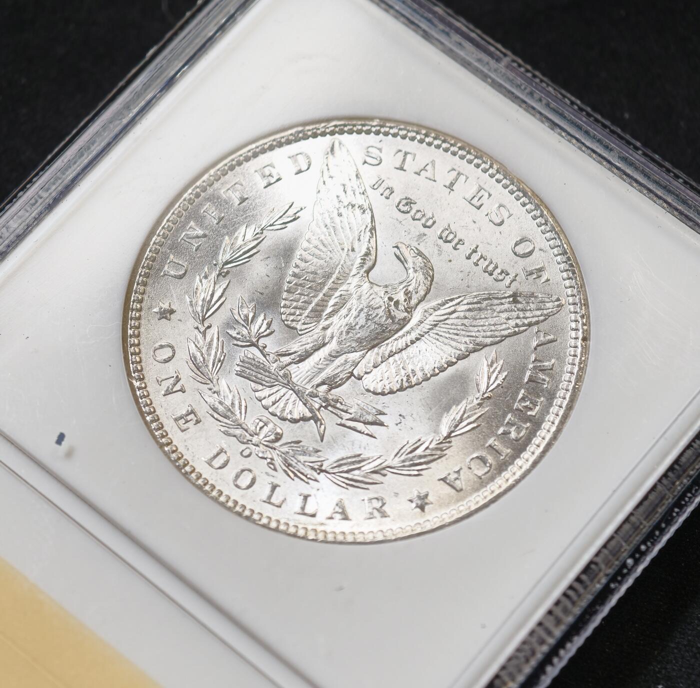 甄臻铺-世界币章拍卖（第59期），甄品场拍品征集中，送拍享返佣金等优惠多多 NGC-MS64 1898年美国O版摩根，少见年份，老盒子严评，盒子手感很好，背面标签时间太久了已经脱落了，盒子没问题