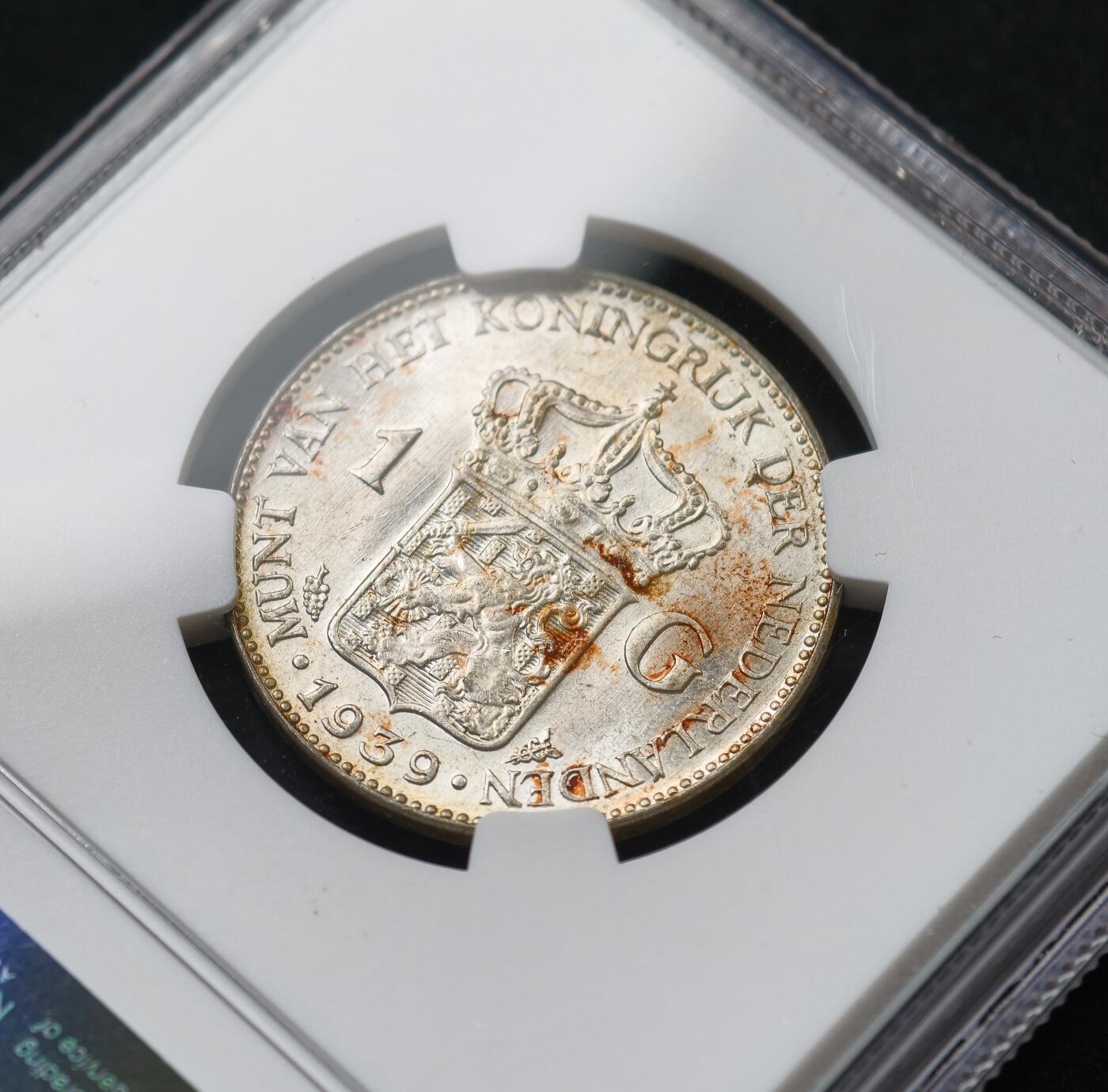 甄臻铺-世界币章拍卖（第59期），甄品场拍品征集中，送拍享返佣金等优惠多多 NGC-UNCD 1939年荷兰威廉明娜1盾，转光好看