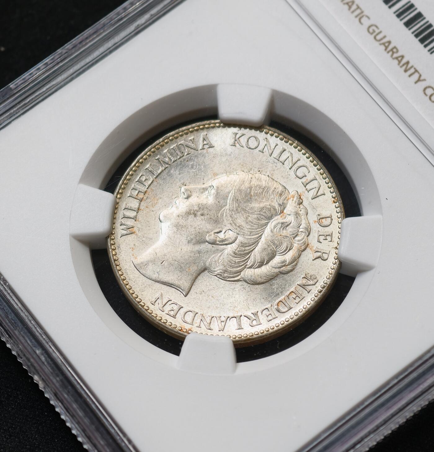 甄臻铺-世界币章拍卖（第59期），甄品场拍品征集中，送拍享返佣金等优惠多多 NGC-UNCD 1939年荷兰威廉明娜1盾，转光好看