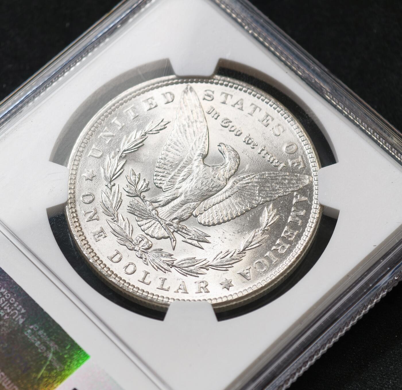 甄臻铺-世界币章拍卖（第59期），甄品场拍品征集中，送拍享返佣金等优惠多多 NGC-MS63 1889年美国摩根，卷拆状态，不多见的年份