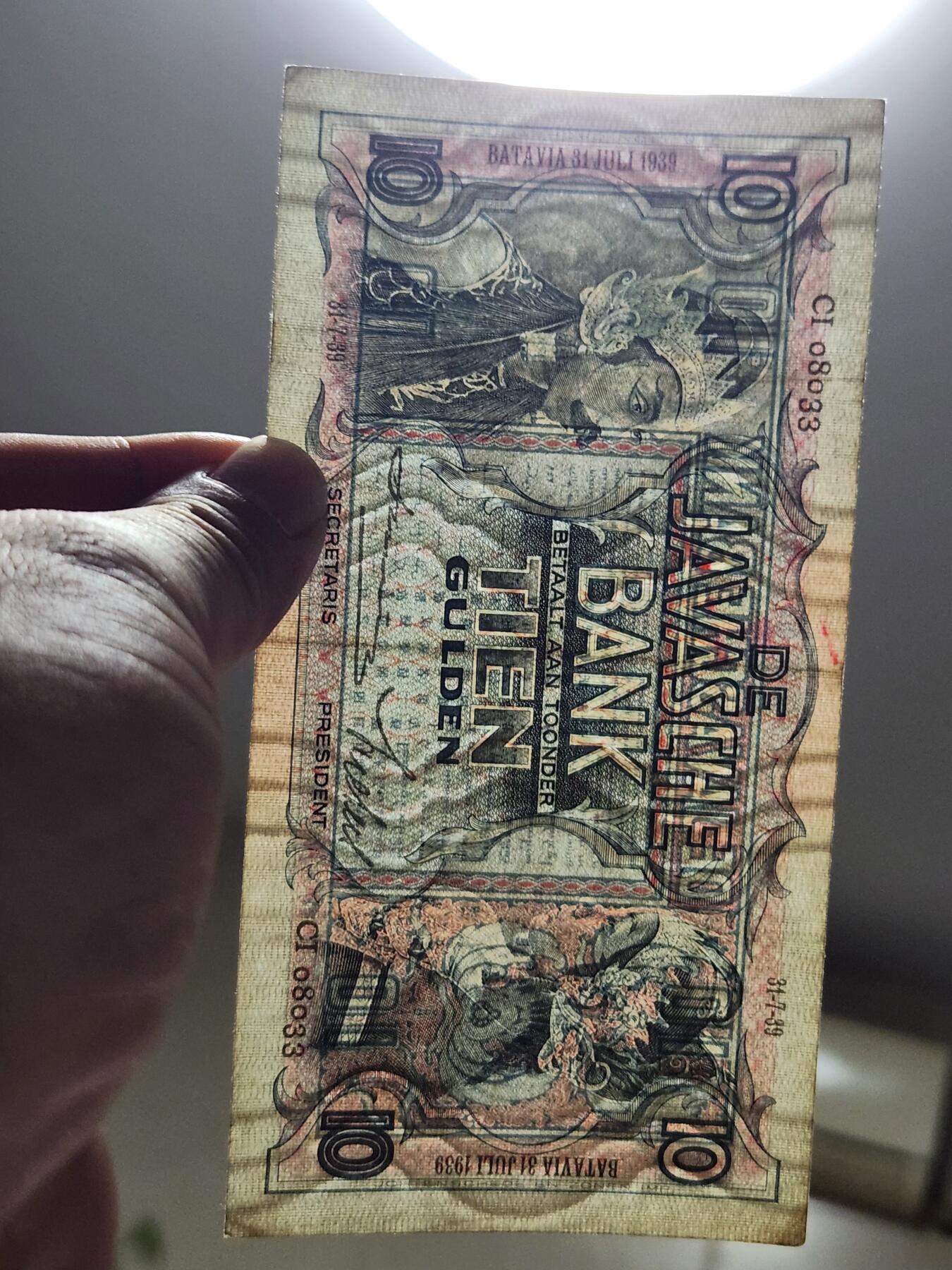 4月8号晚上8点 中外纸币自动截拍第52场 08033荷属东印度10极美品原票