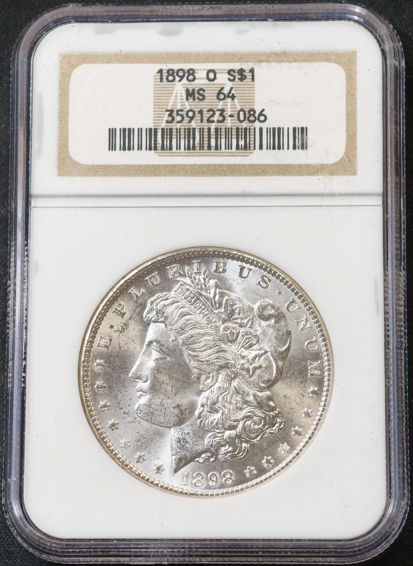 甄臻铺-世界币章拍卖（第59期），甄品场拍品征集中，送拍享返佣金等优惠多多 NGC-MS64 1898年美国O版摩根，少见年份，老盒子严评，盒子手感很好，背面标签时间太久了已经脱落了，盒子没问题