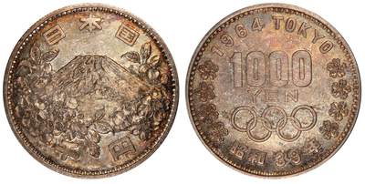 甄臻铺-世界币章拍卖（第59期），甄品场拍品征集中，送拍享返佣金等优惠多多 - PCGS-MS66，日本1964年奥运银币，日本大奥1000日元，带官网高清大图，红绿蓝五彩渐变。盒子正面一处裂纹，表面光滑不影响密封