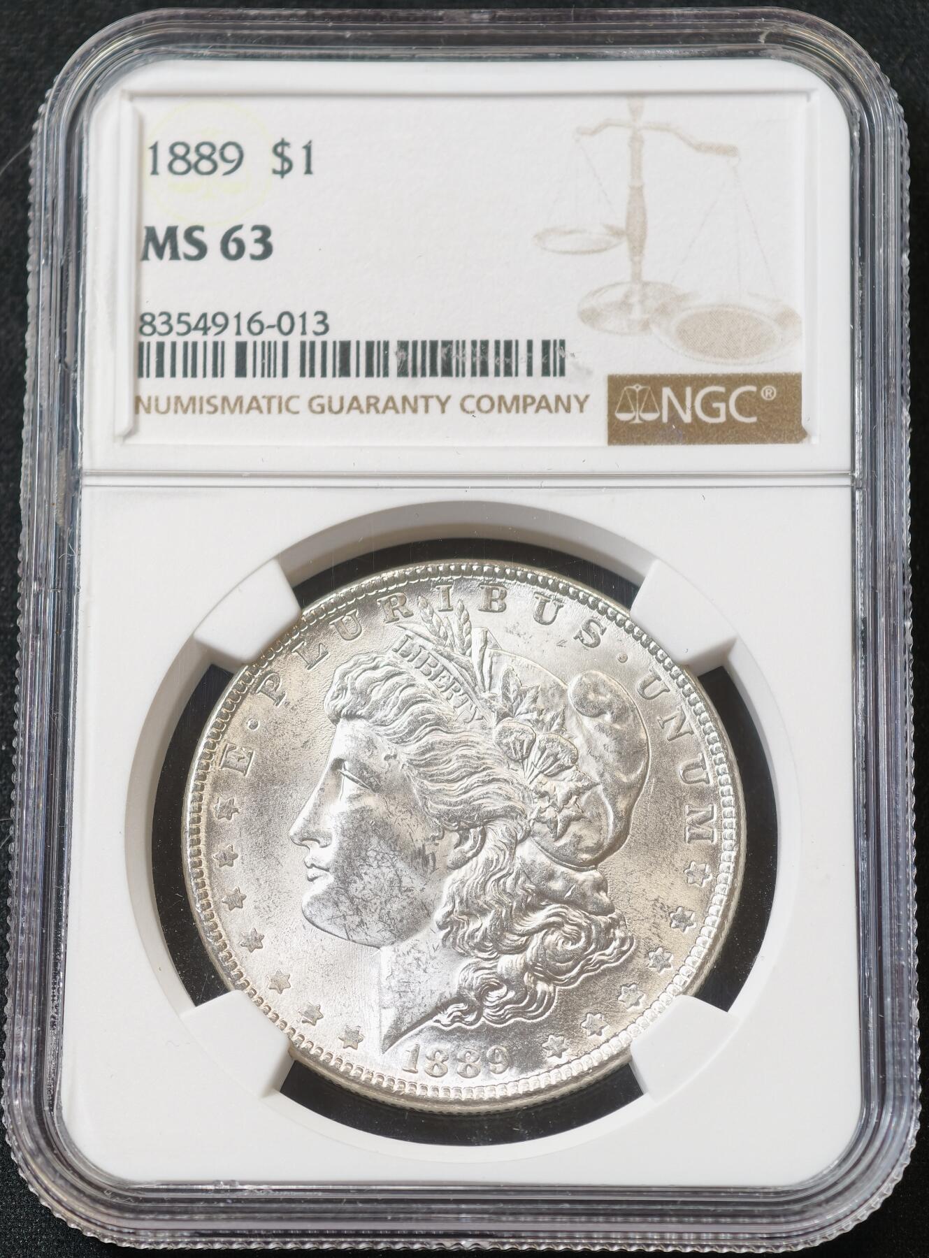 甄臻铺-世界币章拍卖（第59期），甄品场拍品征集中，送拍享返佣金等优惠多多 NGC-MS63 1889年美国摩根，卷拆状态，不多见的年份