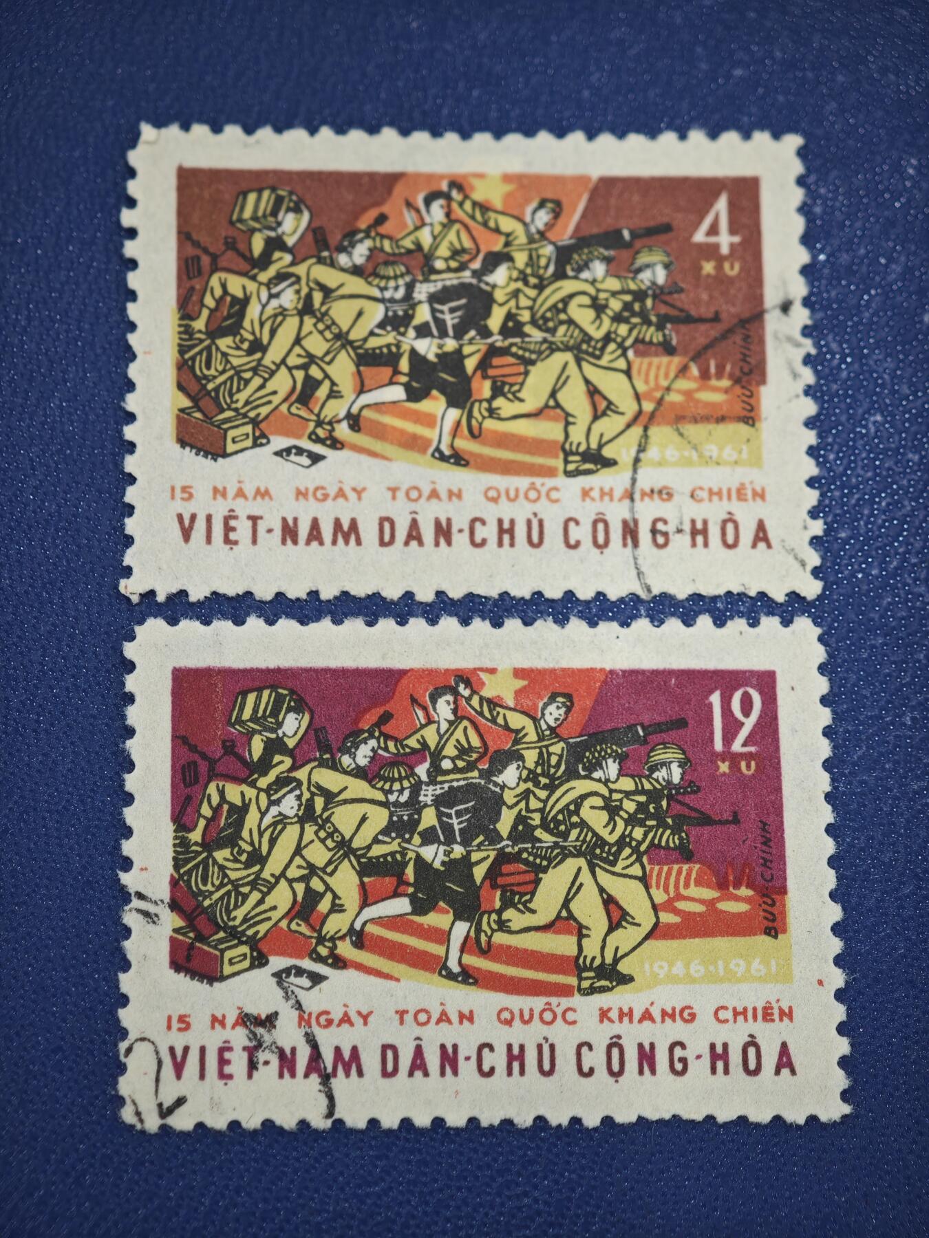 橙子收藏第八期(社会主义国家邮票专场) 两枚邮票出自越南民主共和国（北越） 于1961年发行的一套纪念邮票，全套共2枚，主要用于纪念越南全国抗战(抗击法国🇫🇷）爆发15周年（1946-1961）。