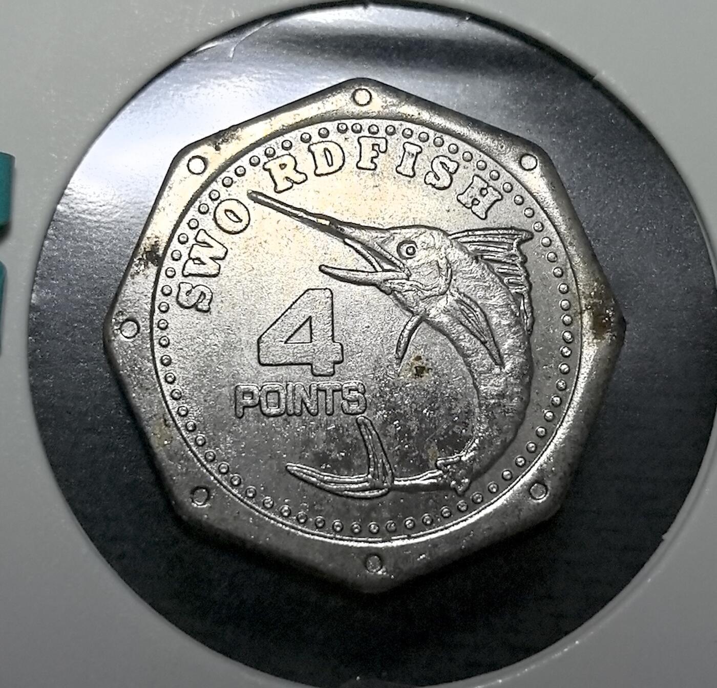 外国优质老铜币纪念币银币专场，周六晚上九点倒数截拍，满百包邮，周日发货,可寄存半年，喜欢朋友微信扫描二维码可直接参拍 墨西哥旗鱼4分纪念代币，背面刻赛事与墨西哥主题，是四驱车赛事文化的趣味收藏遗存。