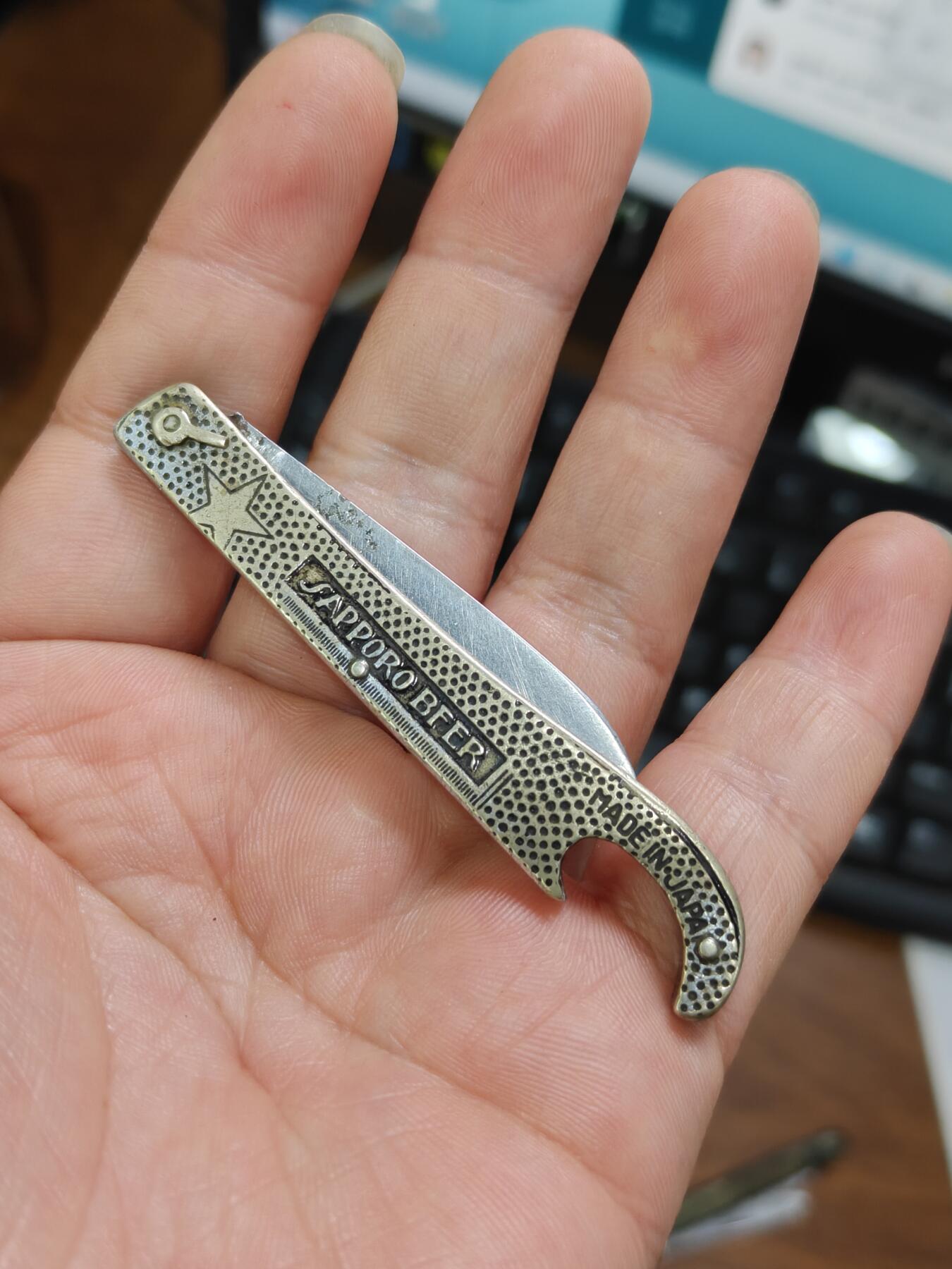 徽章钱币纪念章刺绣杂件专拍 民国铜制开瓶器小刀