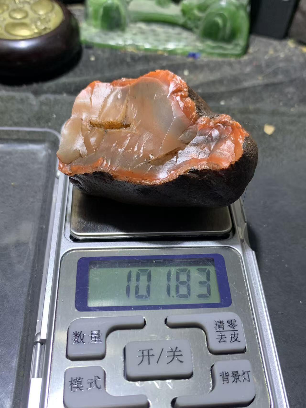 精美川料铁红皮开窗料荔枝冻心南红玛瑙原石一颗，