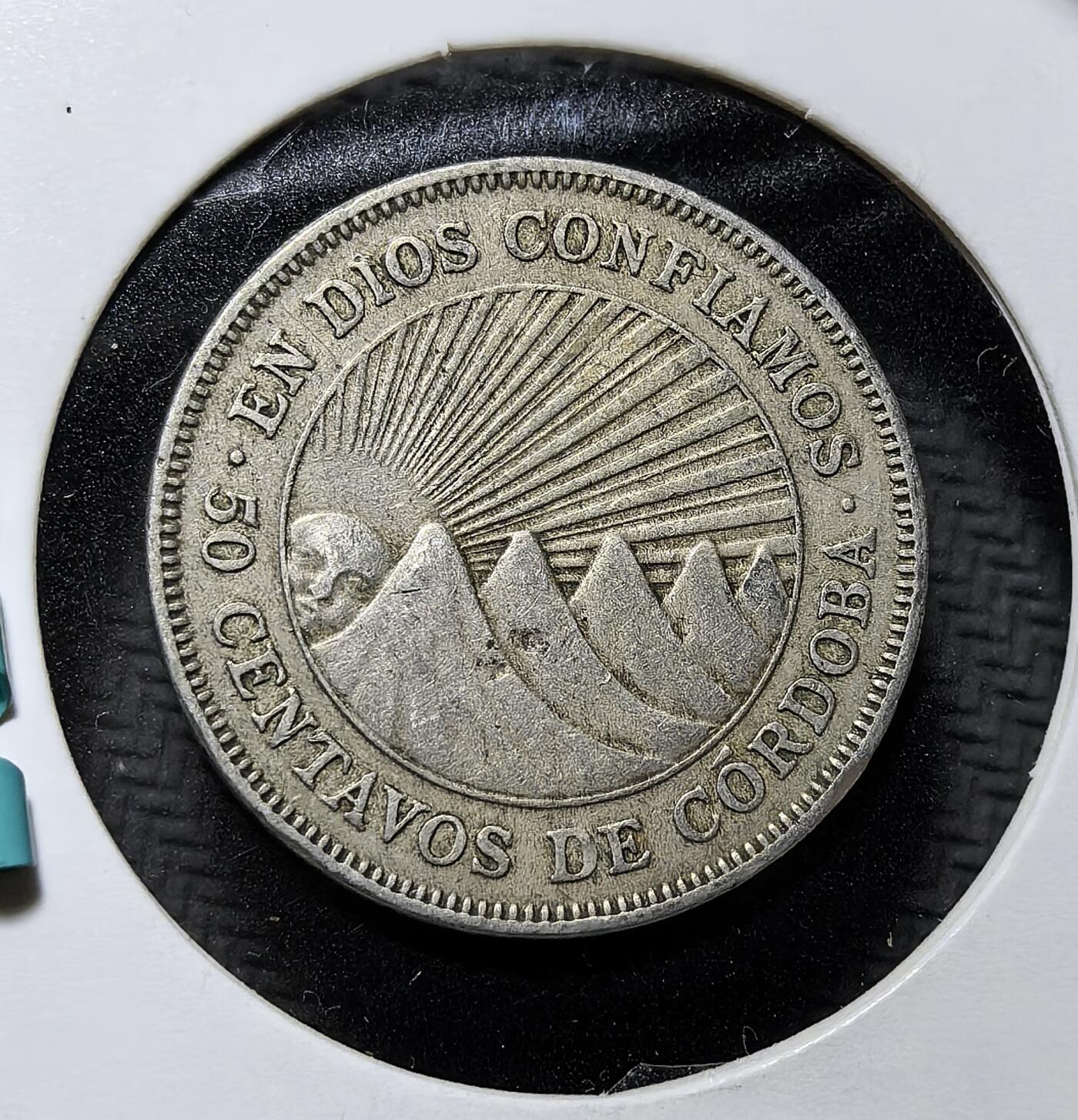 外国优质老铜币纪念币银币专场，周六晚上九点倒数截拍，满百包邮，周日发货,可寄存半年，喜欢朋友微信扫描二维码可直接参拍 尼加拉瓜共和国1939 年50 分。正面为尼加拉瓜前总统费尔南多・斯金德・赫拉多像，背面铸有国名、面值与 “我们信仰上帝” 铭文，是尼加拉瓜独立后流通币，见证中美洲国家历史。