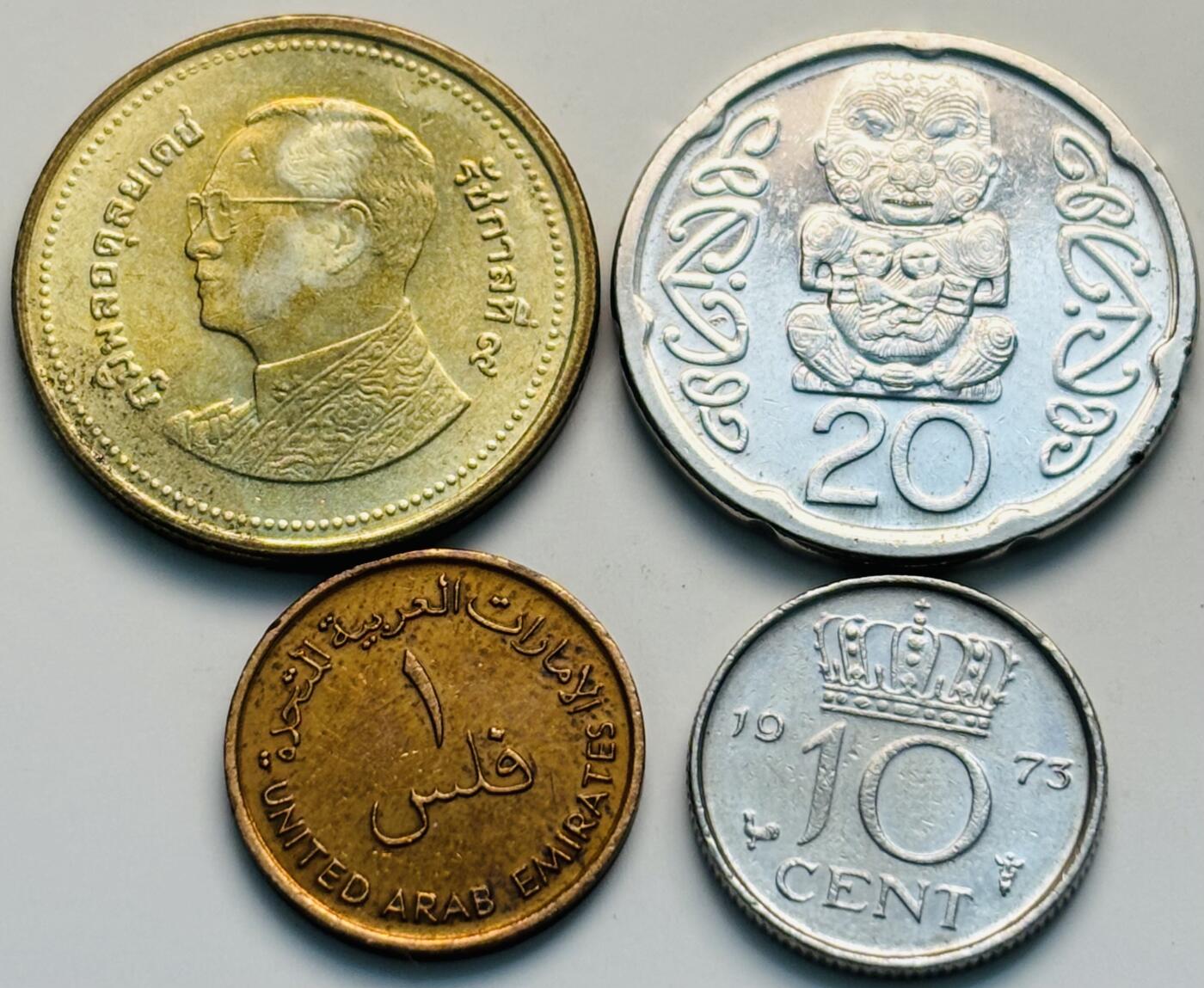 文馨钱币收藏第 299 场，长期接代拍业务 原光品相 新西兰，泰国，阿联酋，荷兰一组 4 枚