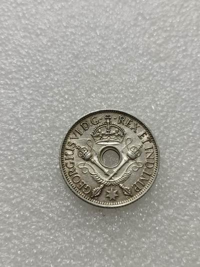 天下钱庄专场欢迎参拍 - 新几内亚中孔银币