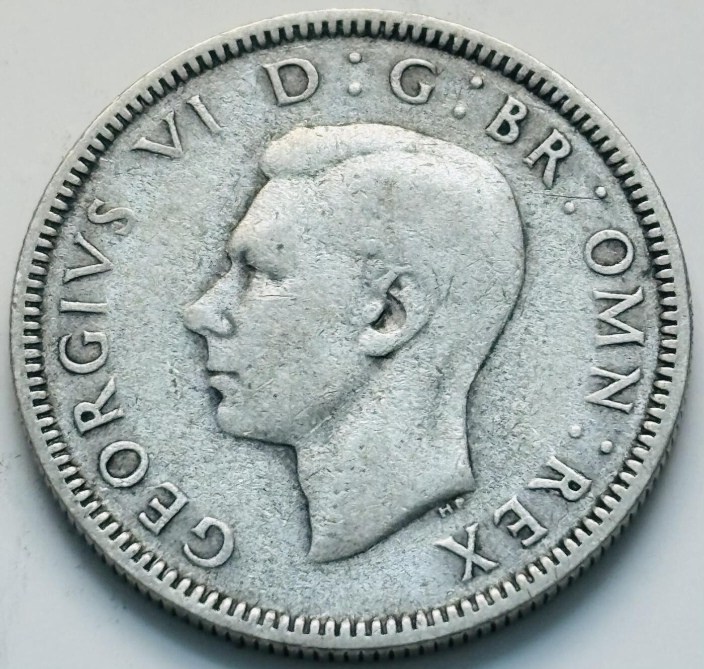 文馨钱币收藏第 299 场，长期接代拍业务 好品 1938 年英国乔治六世 1 先令银币，5.65 克 500 银