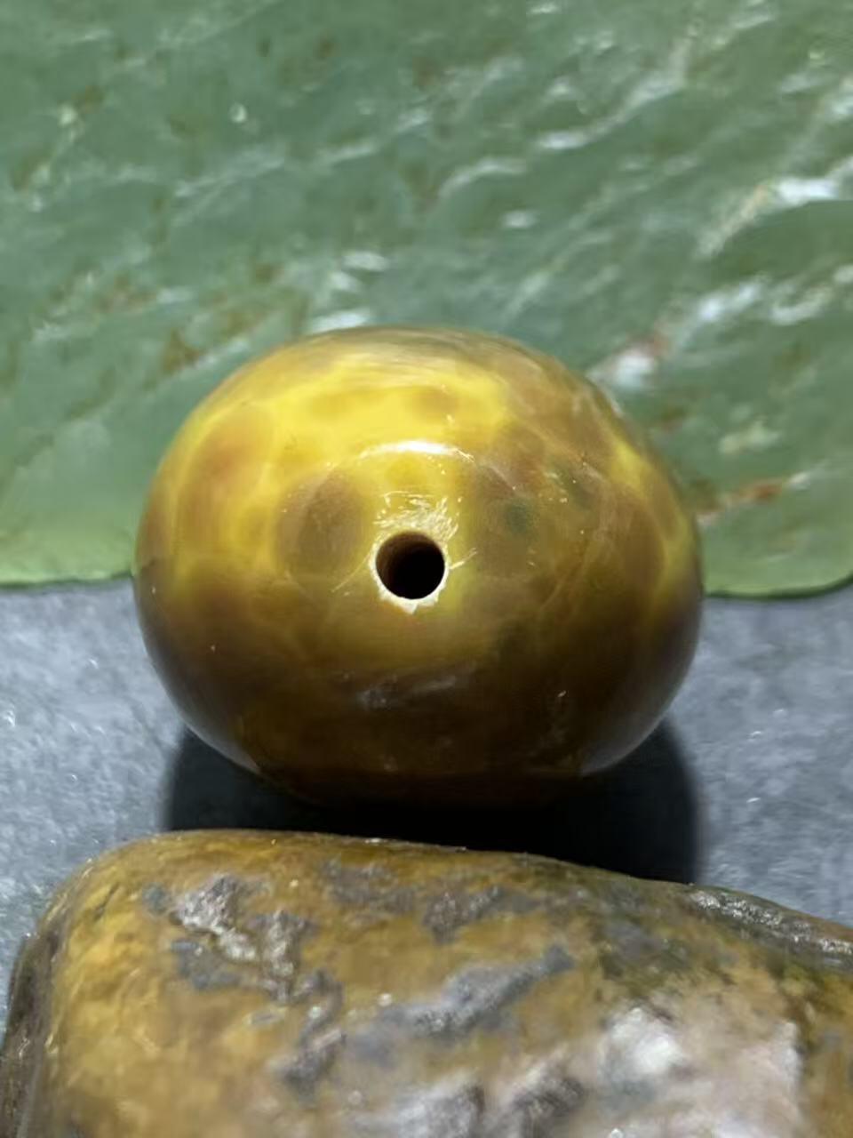 精美高玉化冻料鱼籽纹战国红玛瑙勒子一颗！