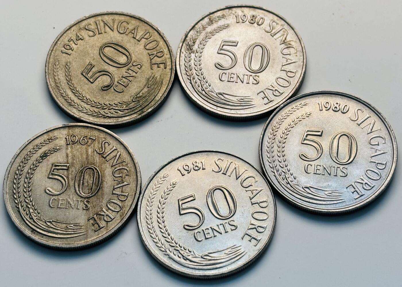 文馨钱币收藏第 299 场，长期接代拍业务 原光好品新加坡老版狮子鱼 50 分一组 5 枚