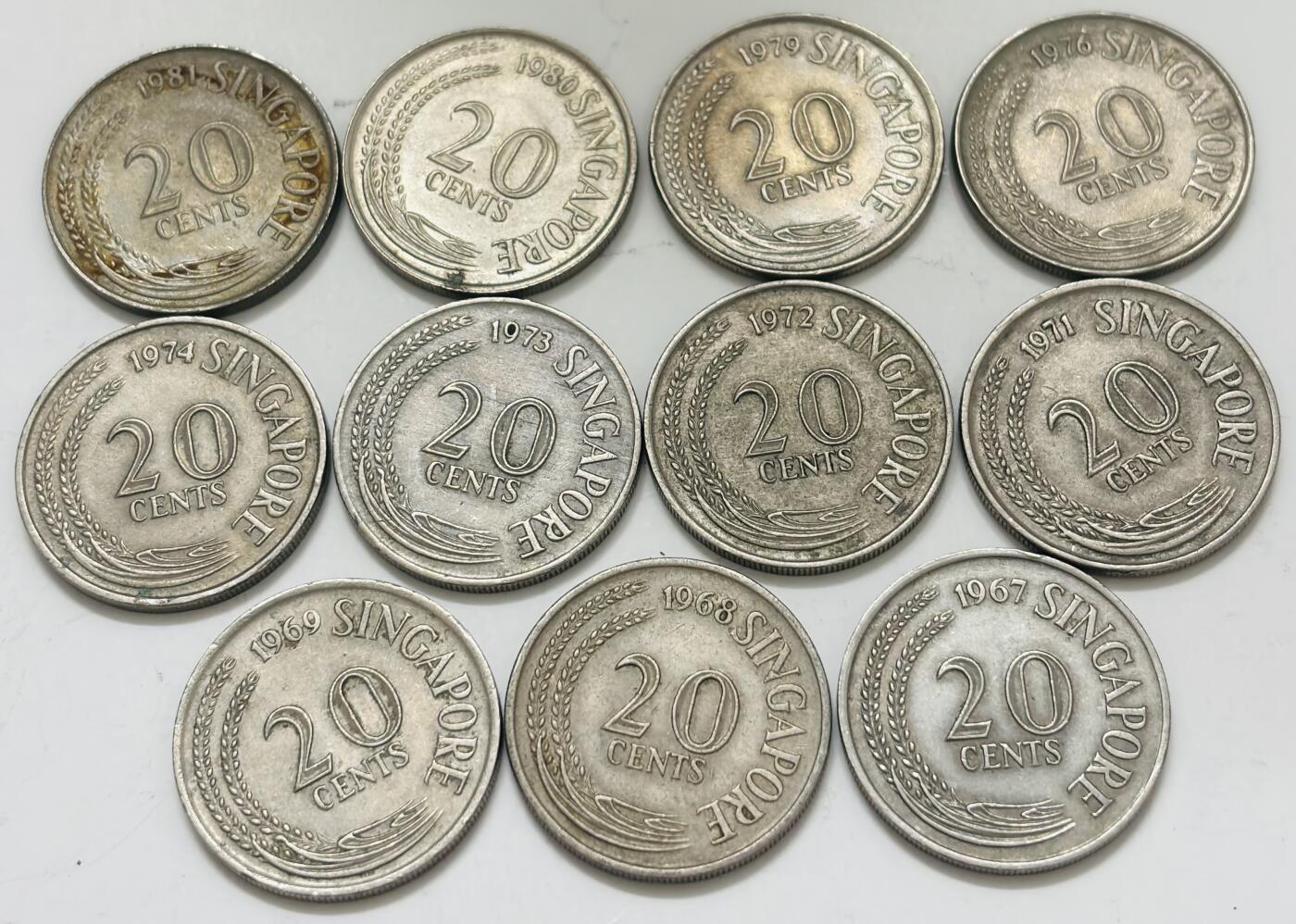 文馨钱币收藏第 299 场，长期接代拍业务 老版新加坡 1967-1981 年 20 分剑鱼 11 枚，2.2 新元