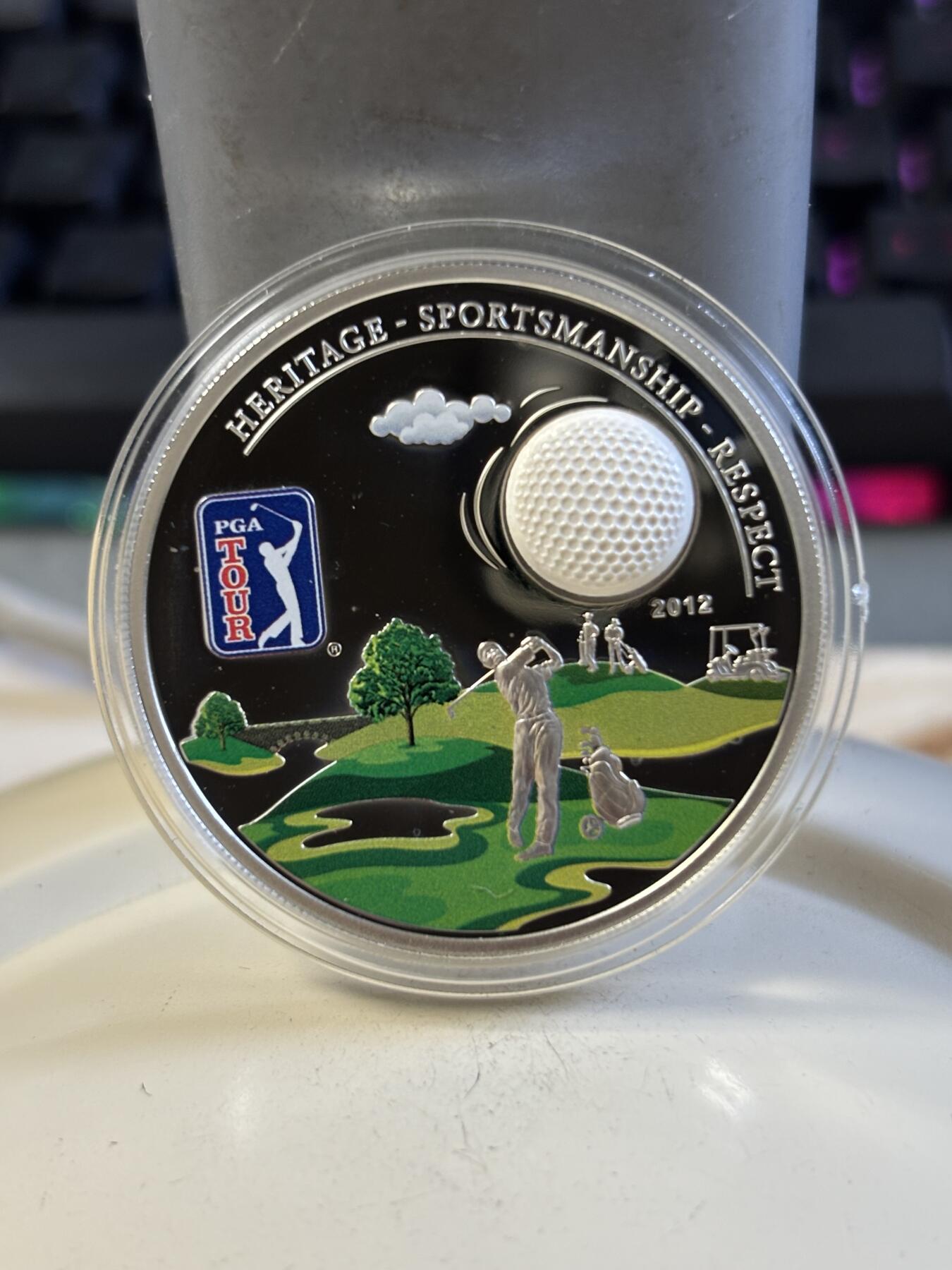 第197期拍卖 库克2012年PGA高尔夫球系列1镶嵌彩色精制纪念银币，925银，20克，发行2500枚