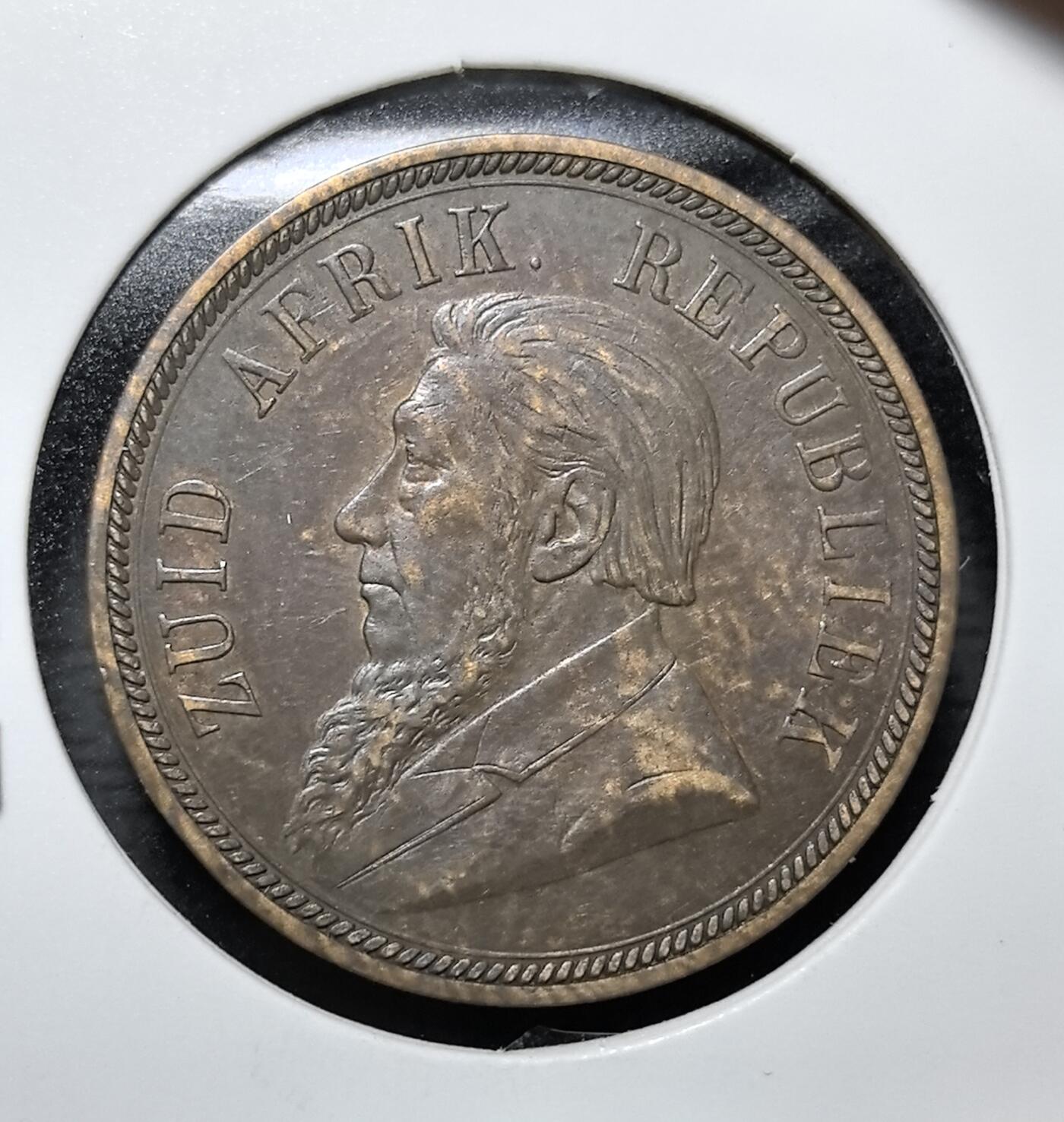 外国优质老铜币纪念币银币专场，周六晚上九点倒数截拍，满百包邮，周日发货,可寄存半年，喜欢朋友微信扫描二维码可直接参拍 南非德兰士瓦共和国 1898 年1 便士铜币，正面为总统克鲁格像，背面是国家纹章，见证布尔人建国与英布战争前的南非历史。