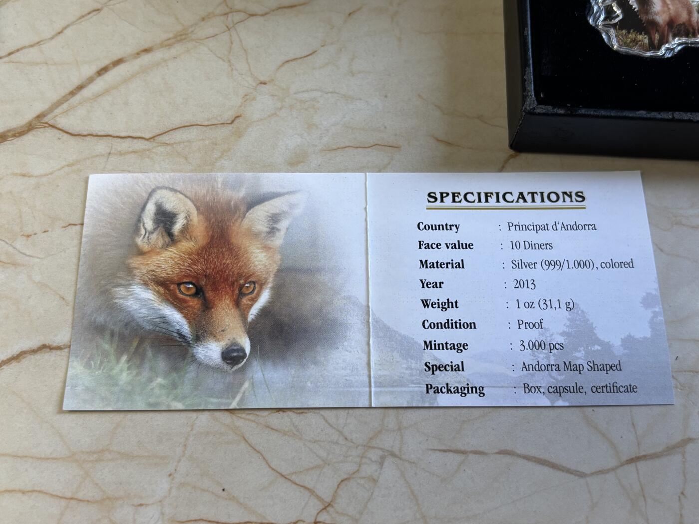 第197期拍卖 安道尔2013年自然宝藏系列狼地图形彩色纪念银币,1盎司999银，发行量3000枚，盒子脱皮银价584