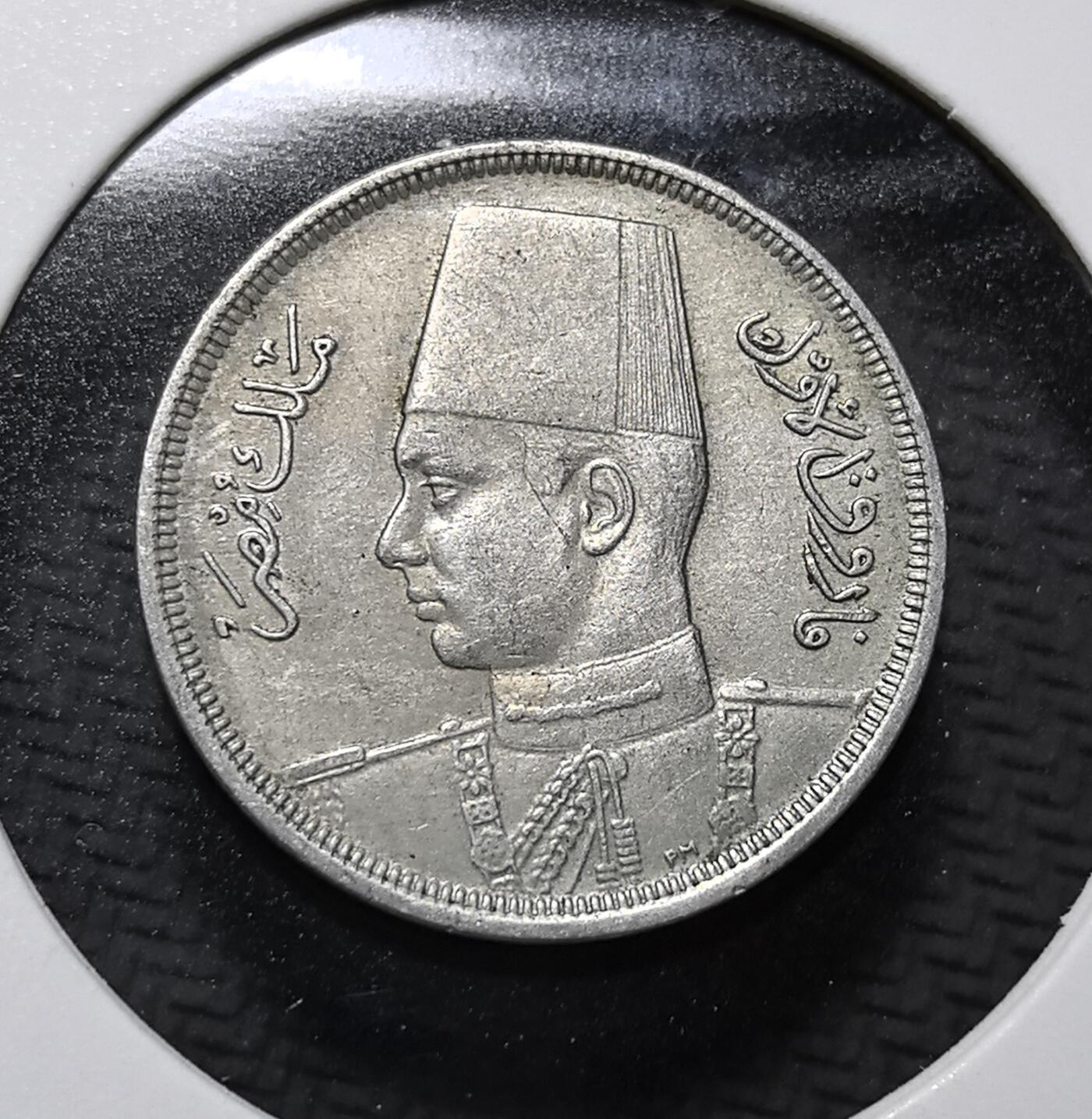 外国优质老铜币纪念币银币专场，周六晚上九点倒数截拍，满百包邮，周日发货,可寄存半年，喜欢朋友微信扫描二维码可直接参拍 埃及法鲁克王朝 1941 年10 米利姆，正面为国王法鲁克一世像，背面铸阿拉伯文面值，是埃及王国末期流通币，见证埃及君主制终结与近代货币史。