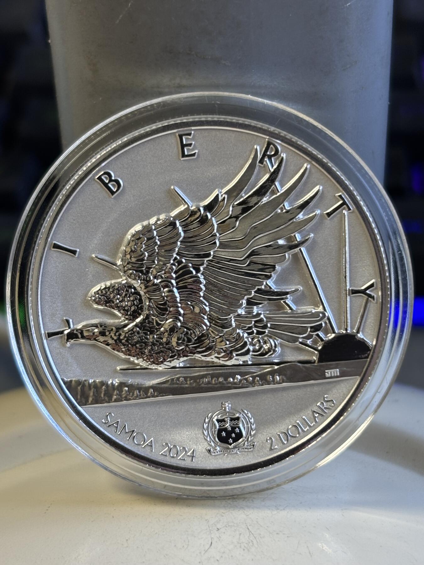第197期拍卖 萨摩亚2024年自由之光飞鹰1盎司反精制高浮雕纪念银币，999银，发行5000枚银价584