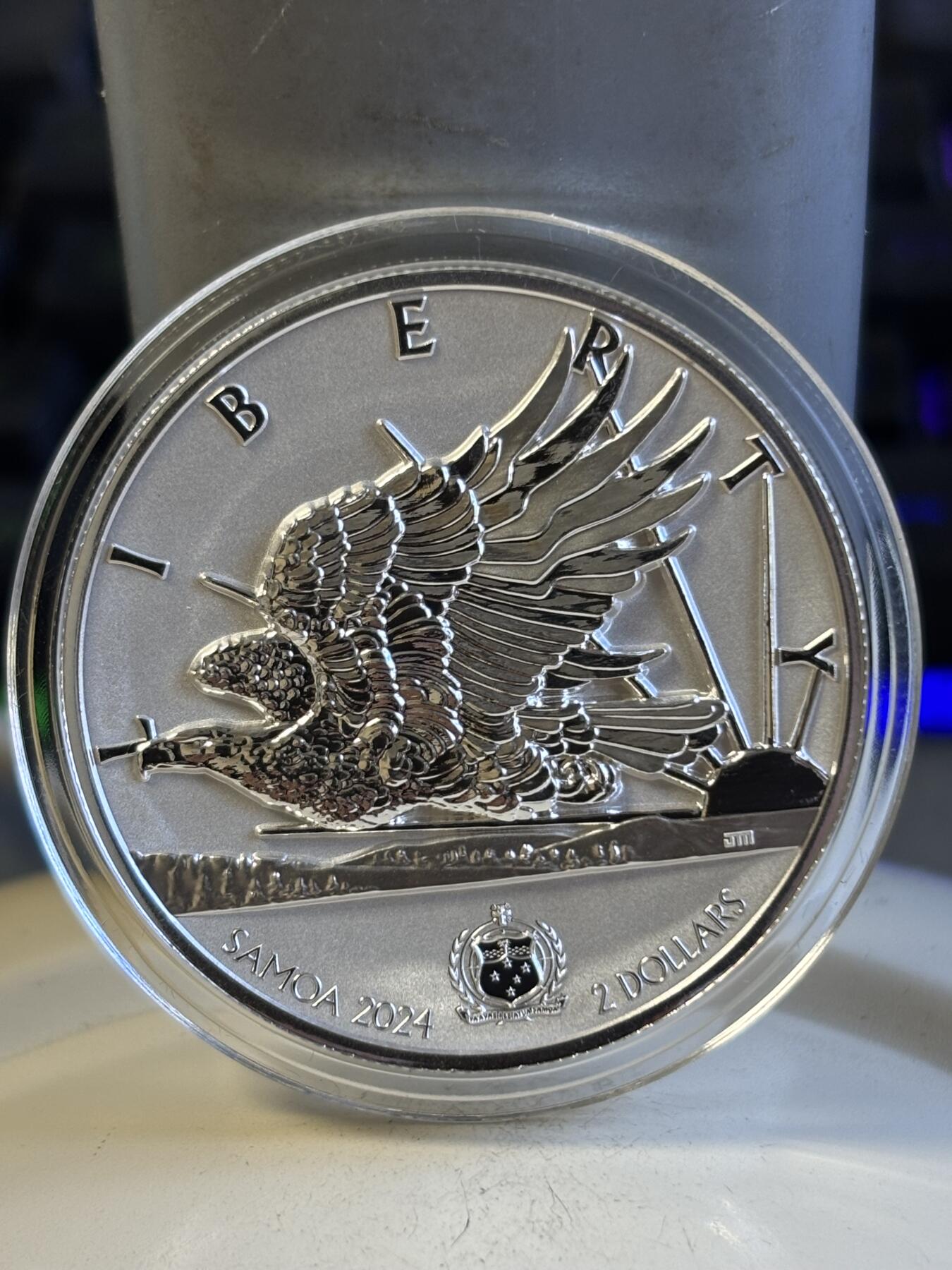 第197期拍卖 萨摩亚2024年自由之光飞鹰1盎司反精制高浮雕纪念银币，999银，发行5000枚银价584