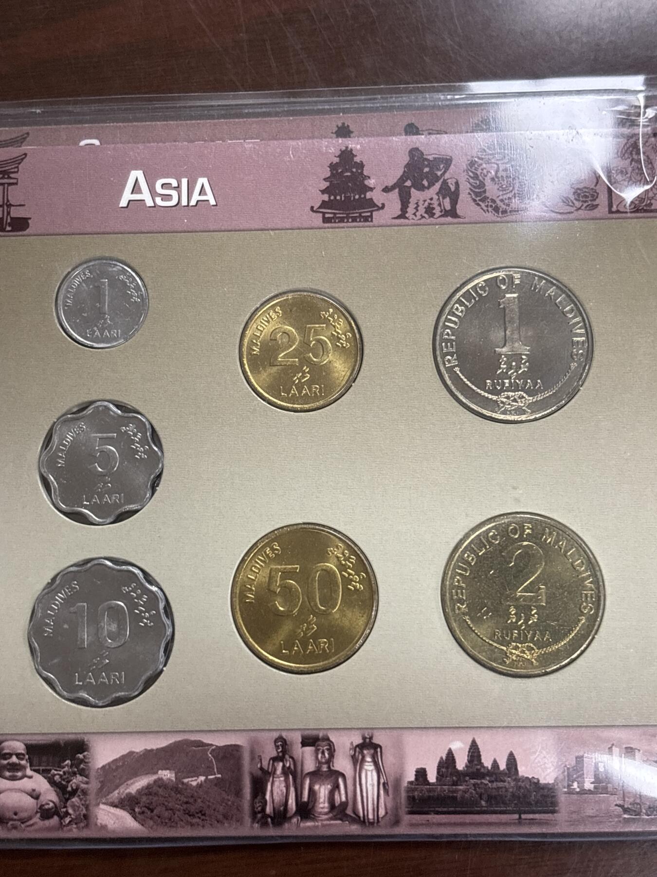 文馨钱币收藏第 299 场，长期接代拍业务 全新马尔代夫 7 枚套册，原册