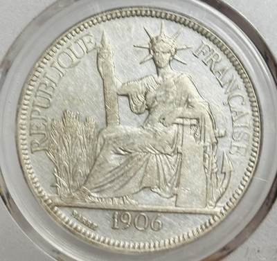 文馨钱币收藏第 299 场，长期接代拍业务 - 1906 年法属印支一元银元，倒闭公司评级 MS62 分，评级币真假不退不换，需要原图私信后台
