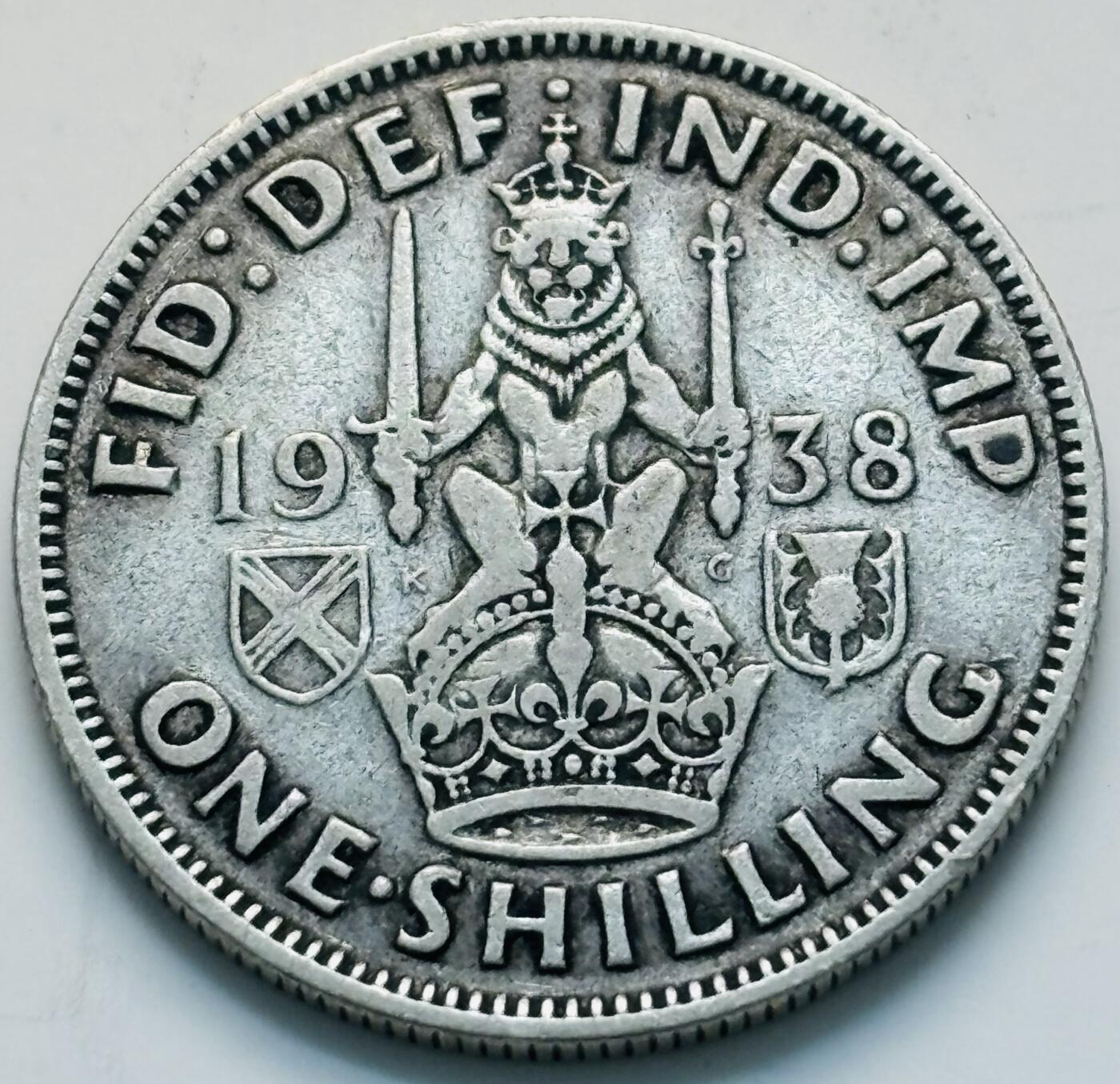 文馨钱币收藏第 299 场，长期接代拍业务 好品 1938 年英国乔治六世 1 先令银币，5.65 克 500 银