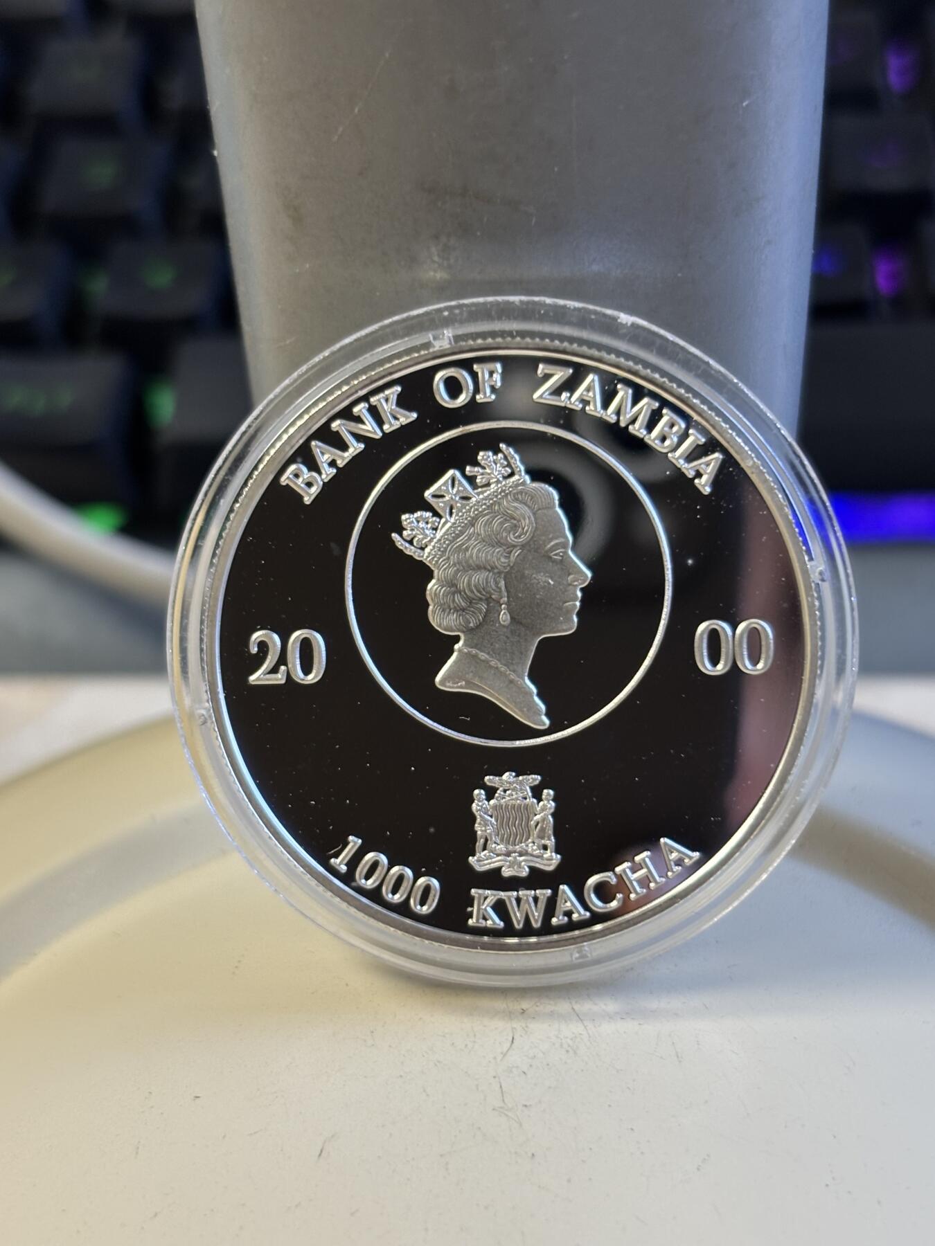 第197期拍卖 赞比亚2000年皇太后千禧年纪念银币，925银，20克，有氧化