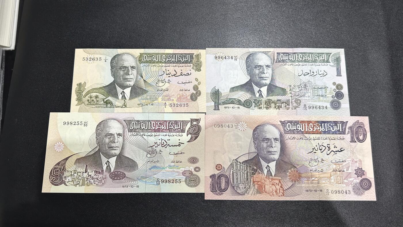 《外钞收藏家》第六百二十六期（精品场）（长期征集拍品、欢迎藏友们联系合作） 突尼斯1973年清版4张一套（0.5、1、5、10第纳尔，UNC得留存不多了）	UNC