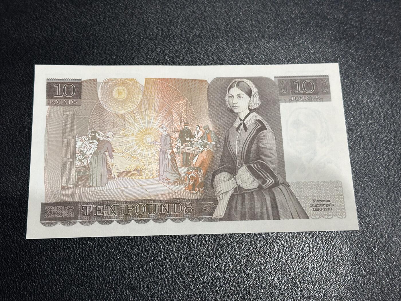 《外钞收藏家》第六百二十六期（精品场）（长期征集拍品、欢迎藏友们联系合作） 英国D序列10镑 全新 有个叫疑似轻微不绝