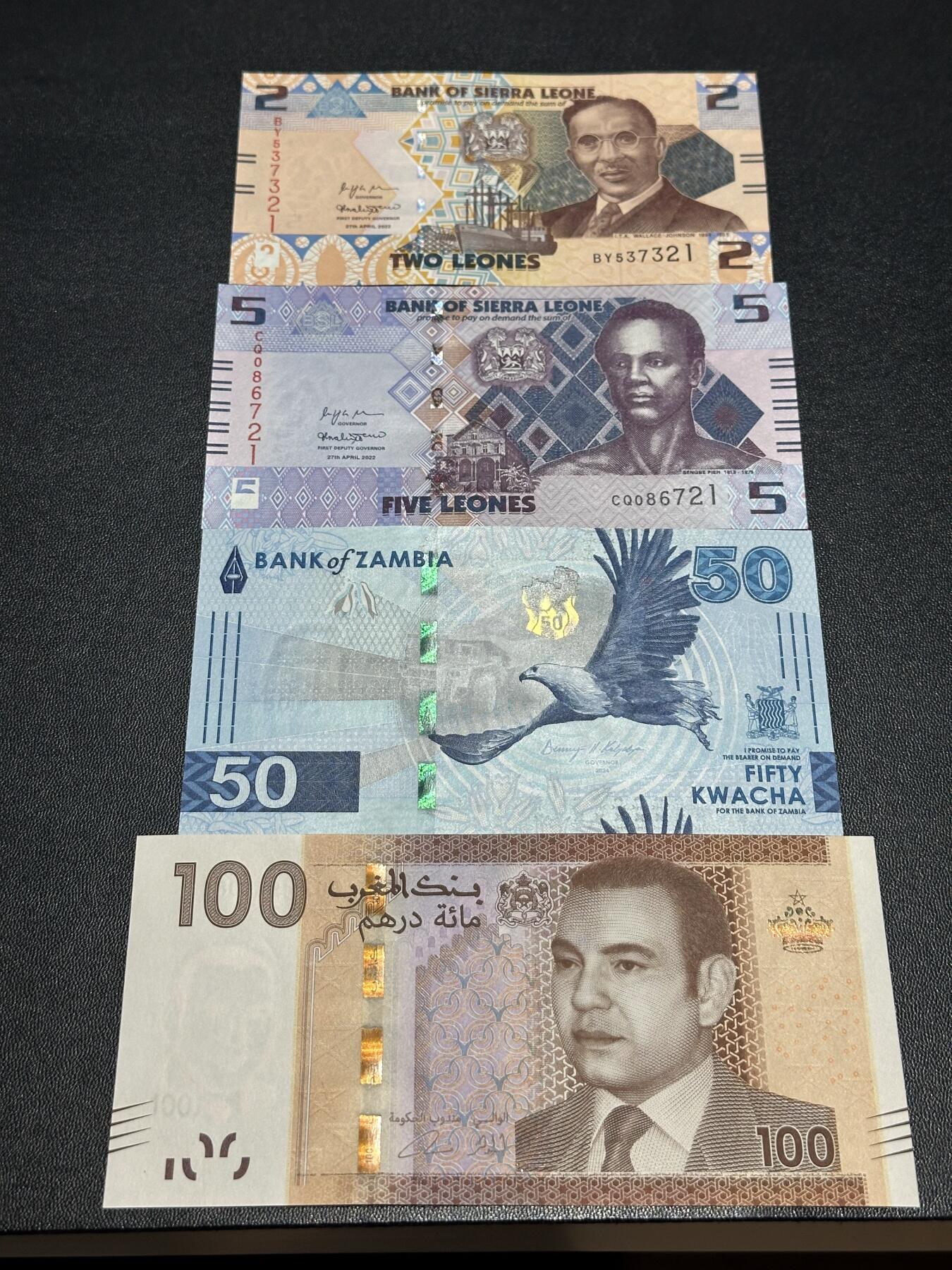 《外钞收藏家》第六百二十六期（精品场）（长期征集拍品、欢迎藏友们联系合作） 塞拉利昂2和5 尾2同+赞比亚50+摩洛哥100 四张一起 全新UNC
