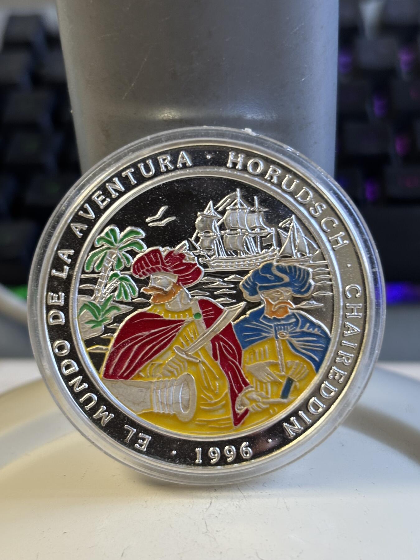 第197期拍卖 西撒哈拉1996年1000比塞塔海盗船1盎司彩色银币，999银，30.5克