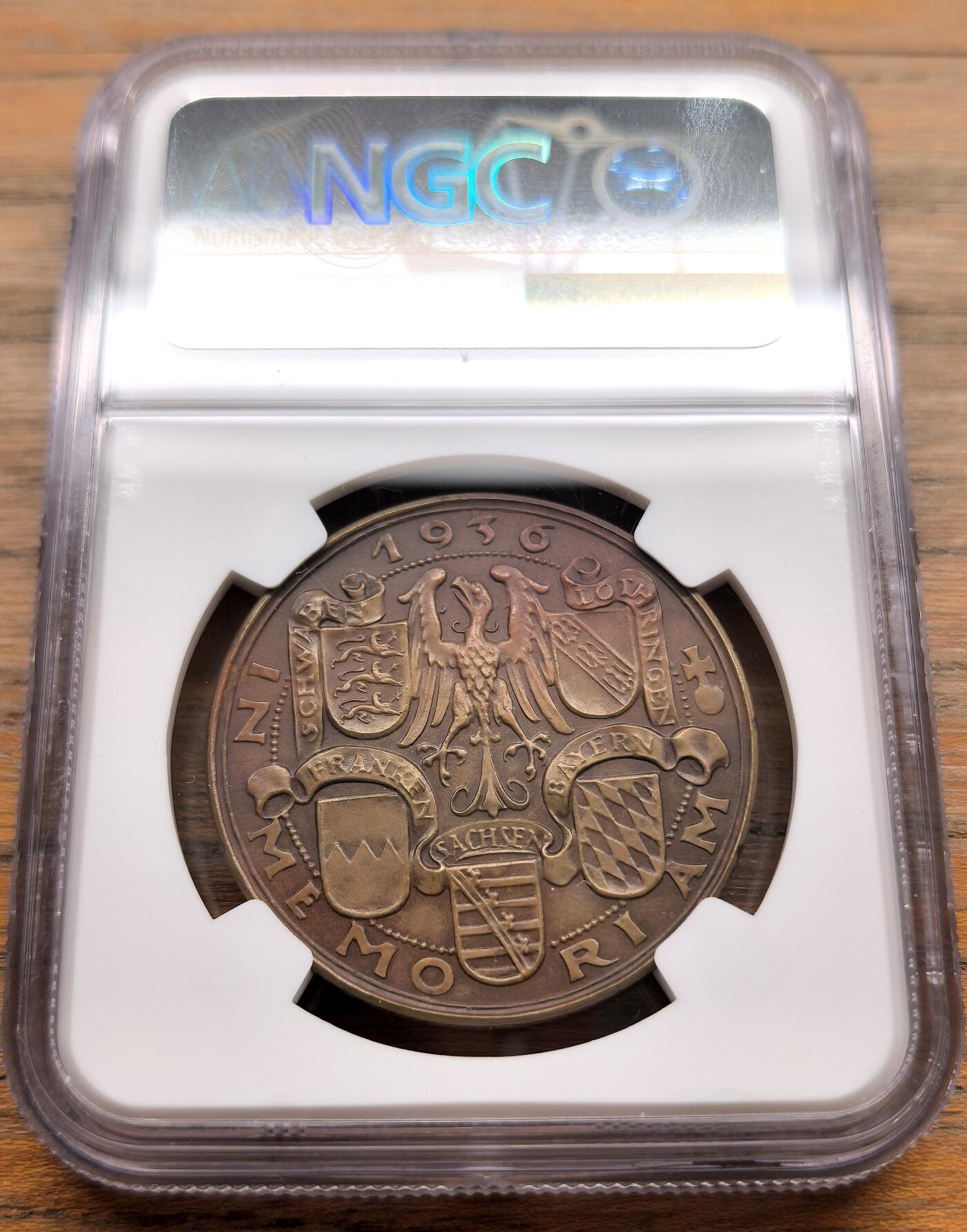 凡希社世界钱币微拍第三百二十二期 1936德国海因里希一世逝世千年纪念铜章NGC-MS63，卡尔哥茨作品，既是历史人物纪念章，更是二十世纪三十年代德意志民族主义思潮的集中体现。