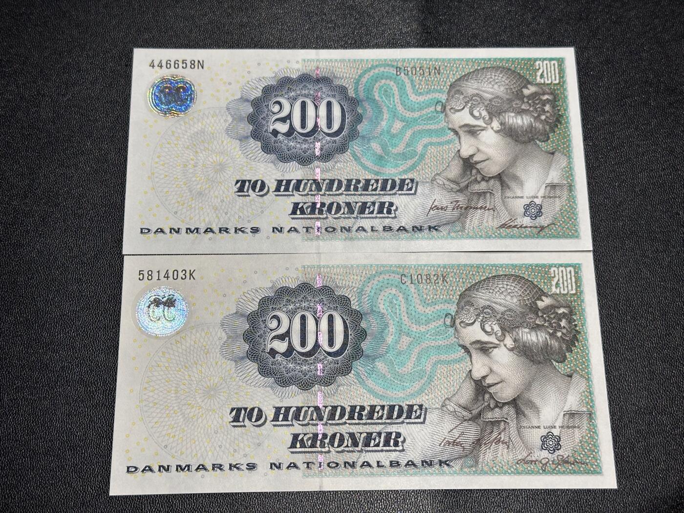 《外钞收藏家》第六百二十六期（精品场）（长期征集拍品、欢迎藏友们联系合作） 丹麦浮雕版200克朗2张不同年份不同签名（绝品可尝试送评，女歌剧家海博格）	绝品