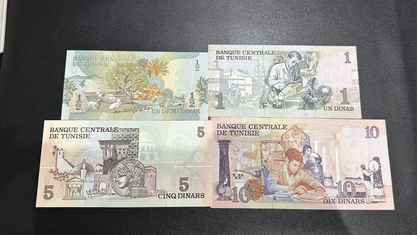 《外钞收藏家》第六百二十六期（精品场）（长期征集拍品、欢迎藏友们联系合作） 突尼斯1973年清版4张一套（0.5、1、5、10第纳尔，UNC得留存不多了）	UNC