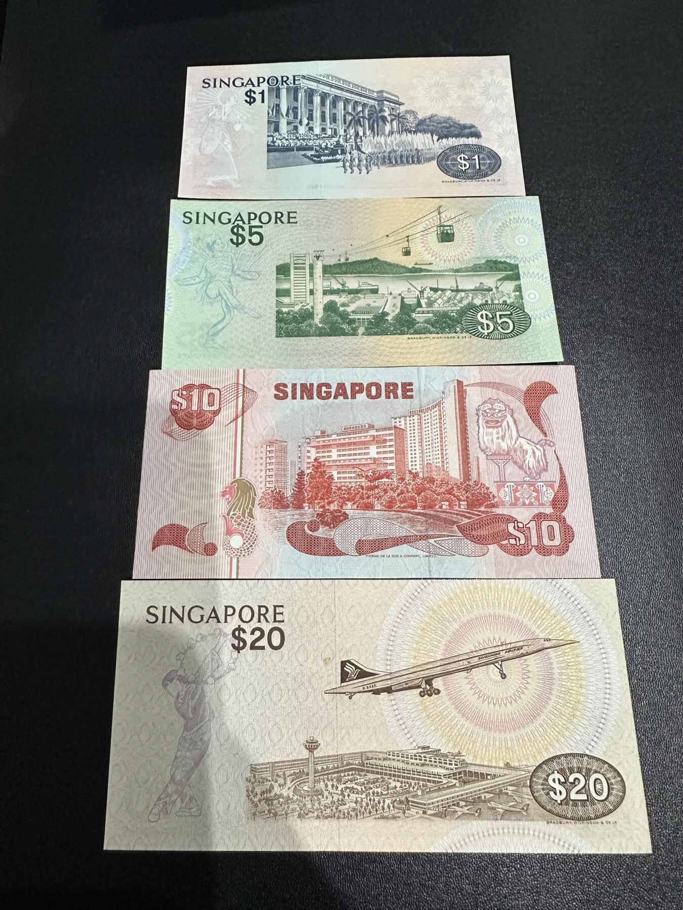 《外钞收藏家》第六百二十六期（精品场）（长期征集拍品、欢迎藏友们联系合作） 新加坡鸟版1/5/10/20元4张小套（UNC品相不多见了，除了1其他全程无47） 	UNC 有轻微潮