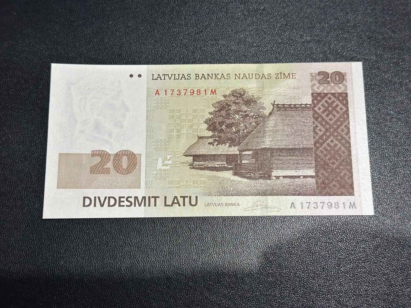 《外钞收藏家》第六百二十六期（精品场）（长期征集拍品、欢迎藏友们联系合作） 2009年拉脱维亚20 全新UNC