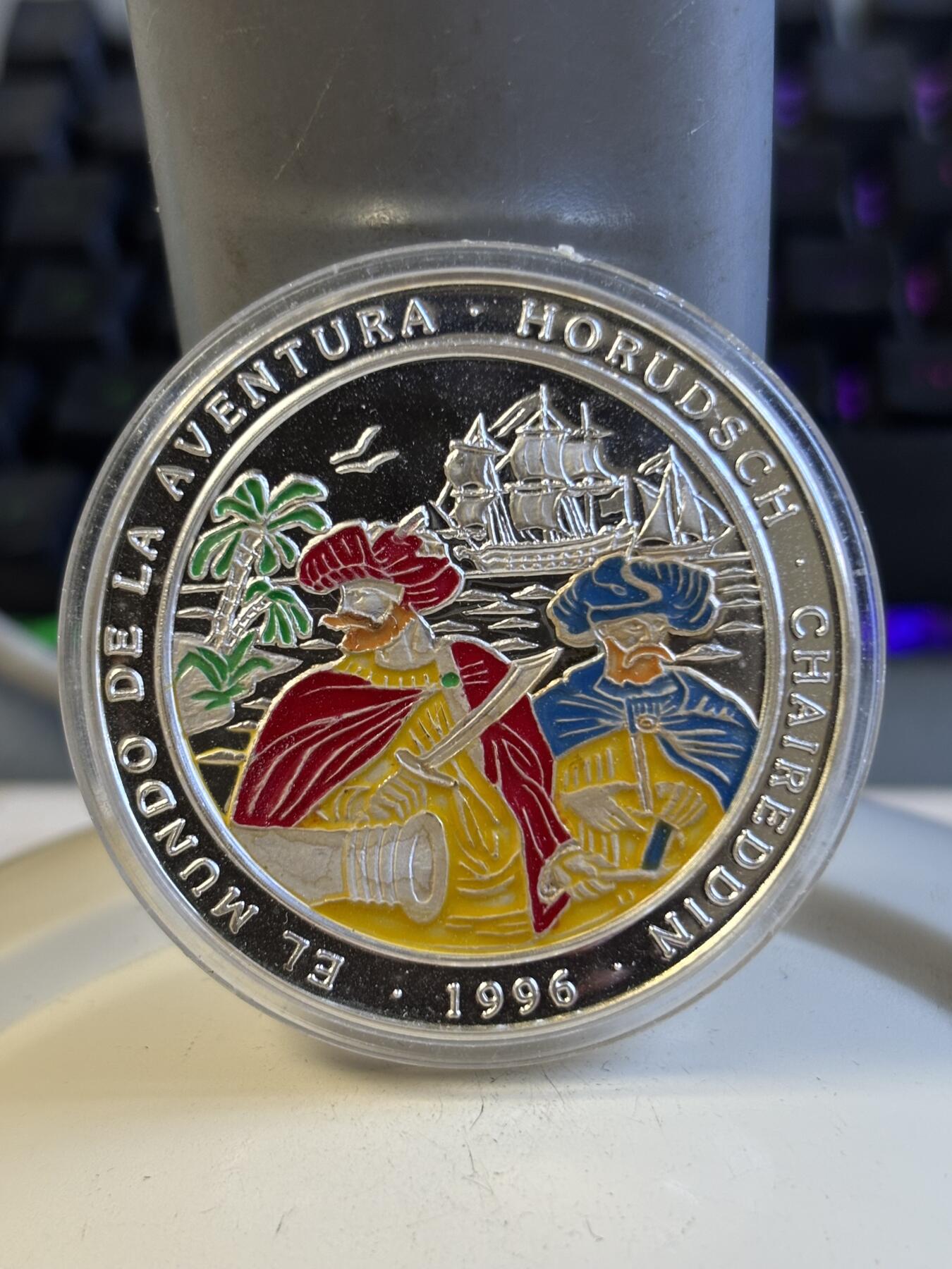 第197期拍卖 西撒哈拉1996年1000比塞塔海盗船1盎司彩色银币，999银，30.5克