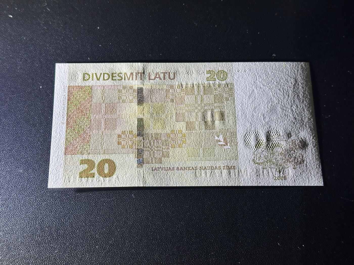 《外钞收藏家》第六百二十六期（精品场）（长期征集拍品、欢迎藏友们联系合作） 2009年拉脱维亚20 全新UNC