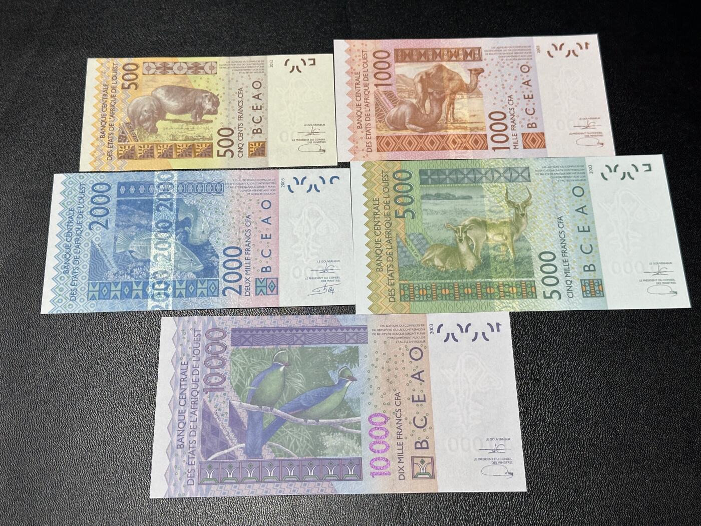 《外钞收藏家》第六百二十六期（精品场）（长期征集拍品、欢迎藏友们联系合作） 西非共同体5张一套（500-1万法郎，A字母 科特迪瓦；有多张全程无47）	UNC