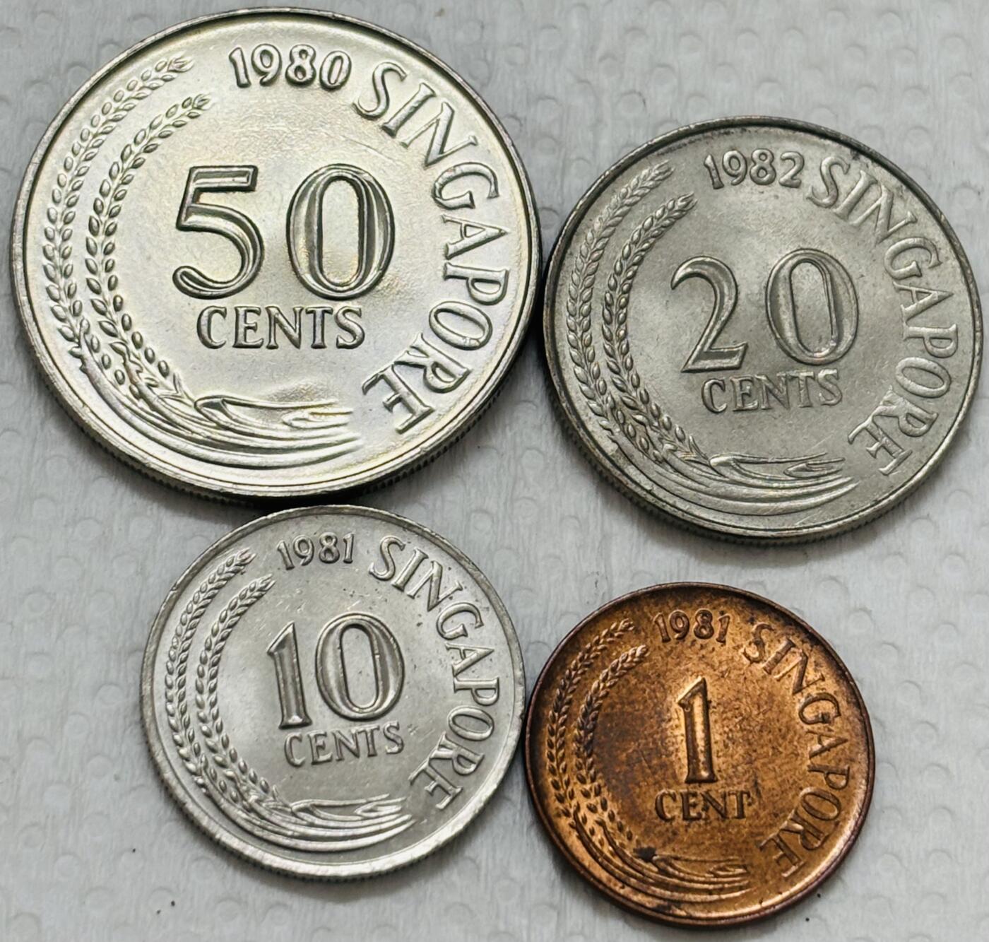 文馨钱币收藏第 299 场，长期接代拍业务 原光品相老版新加坡动物版 1-50 分 4 枚套