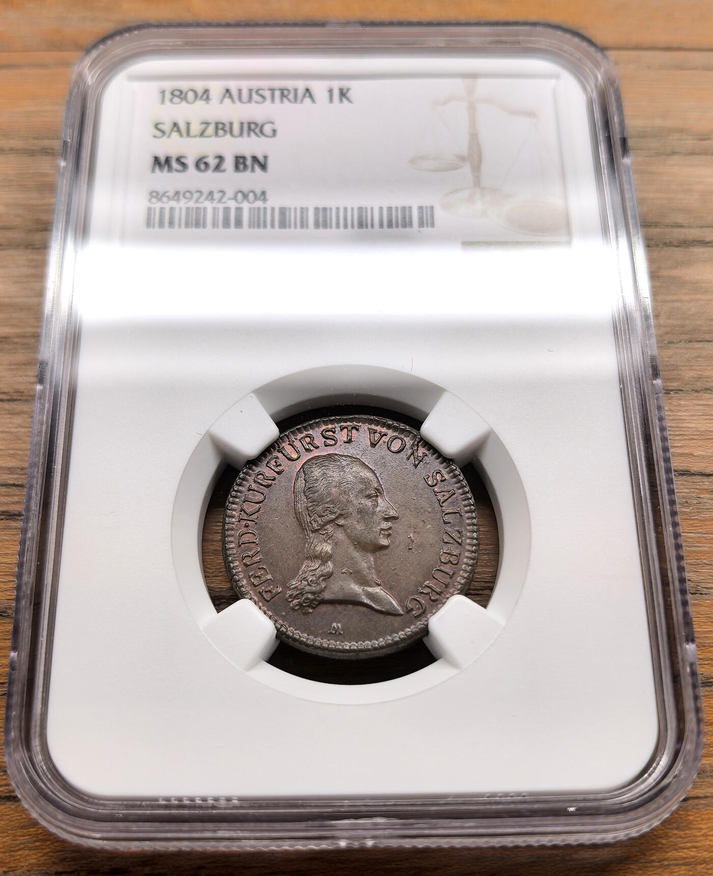 凡希社世界钱币微拍第三百二十二期 1804奥地利萨尔茨堡主教斐迪南三世1克鲁泽铜币NGC-MS62，1804年是萨尔茨堡世俗化后首批奥地利管辖的铸币年份，比1803年大主教时期铸币存世量更少。